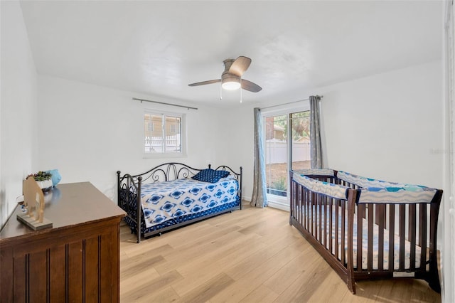 525 Gornto Lake Rd, Brandon, FL 33510 - bedroom with light wood-type flooring and a ceiling fan