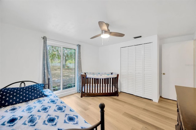 525 Gornto Lake Rd, Brandon, FL 33510 - bedroom featuring light wood finished floors, ceiling fan, and a closet