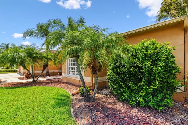 13028 Prestwick Dr, Riverview, FL 33579 - view of property exterior with stucco siding