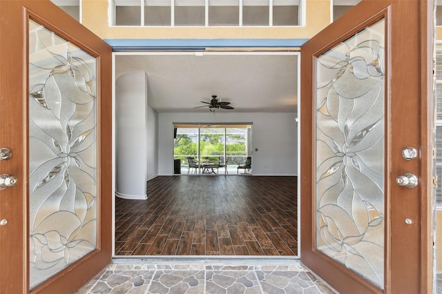 13028 Prestwick Dr, Riverview, FL 33579 - foyer entrance featuring a ceiling fan, baseboards, and wood finished floors