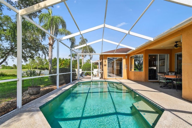 13028 Prestwick Dr, Riverview, FL 33579 - view of swimming pool featuring a patio area, glass enclosure, and a ceiling fan