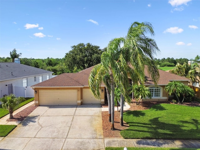 13028 Prestwick Dr, Riverview, FL 33579 - view of front facade featuring a garage, driveway, and stucco siding