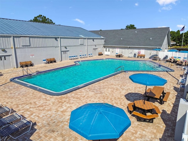 13028 Prestwick Dr, Riverview, FL 33579 - community pool featuring a patio area