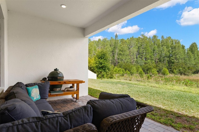 6154 Marsh Trail Dr, Odessa, FL 33556 - view of patio / terrace featuring a forest view