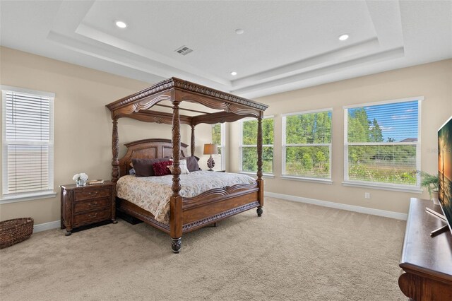 6154 Marsh Trail Dr, Odessa, FL 33556 - carpeted bedroom featuring a raised ceiling, baseboards, and recessed lighting