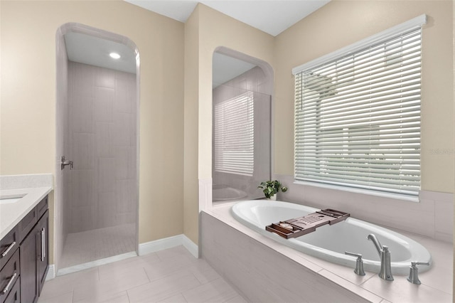 6154 Marsh Trail Dr, Odessa, FL 33556 - bathroom featuring a bath, vanity, and walk in shower