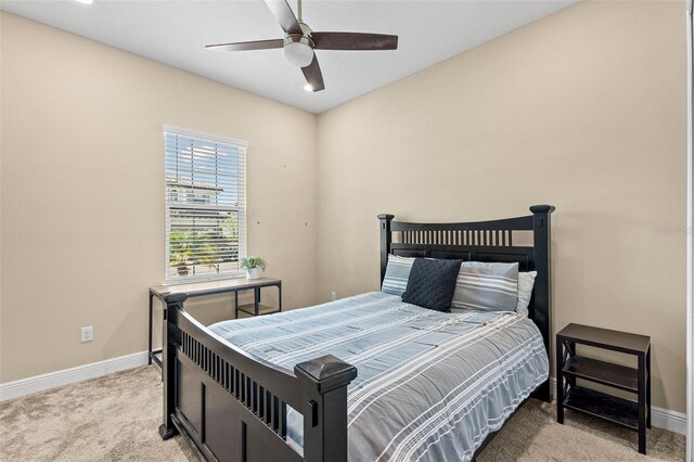 6154 Marsh Trail Dr, Odessa, FL 33556 - carpeted bedroom featuring baseboards and ceiling fan