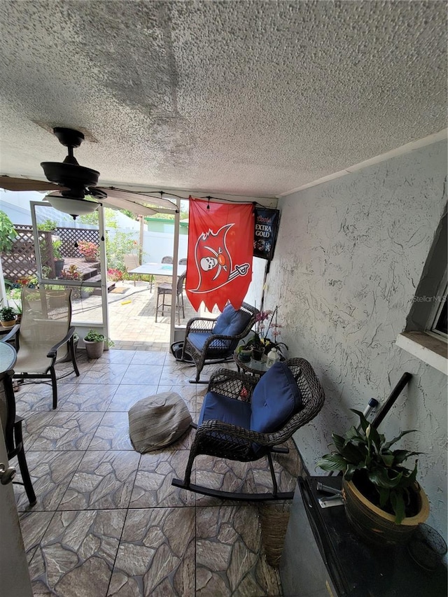 view of patio with a ceiling fan