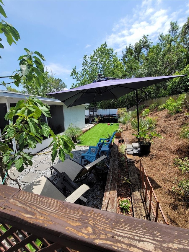 wooden deck featuring a patio