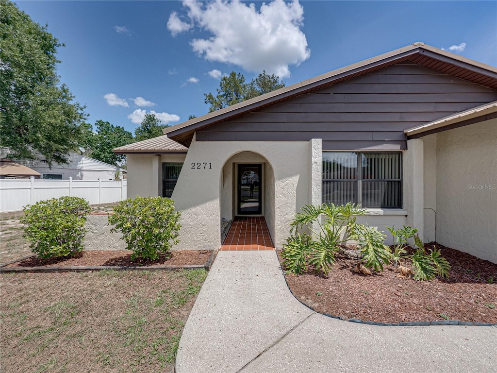 2271 Crystal Grove Ln, Lakeland, FL 33801 - view of front of property featuring stucco siding