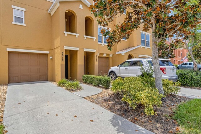 9013 White Sage Loop, Lakewood Ranch, FL 34202 - multi unit property with a garage, stucco siding, and concrete driveway