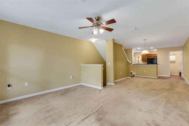 9013 White Sage Loop, Lakewood Ranch, FL 34202 - unfurnished living room featuring light carpet, ceiling fan, baseboards, and recessed lighting