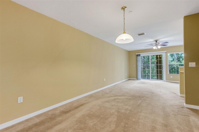 9013 White Sage Loop, Lakewood Ranch, FL 34202 - empty room featuring ceiling fan, baseboards, and light carpet