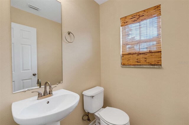 9013 White Sage Loop, Lakewood Ranch, FL 34202 - half bath with a sink and toilet