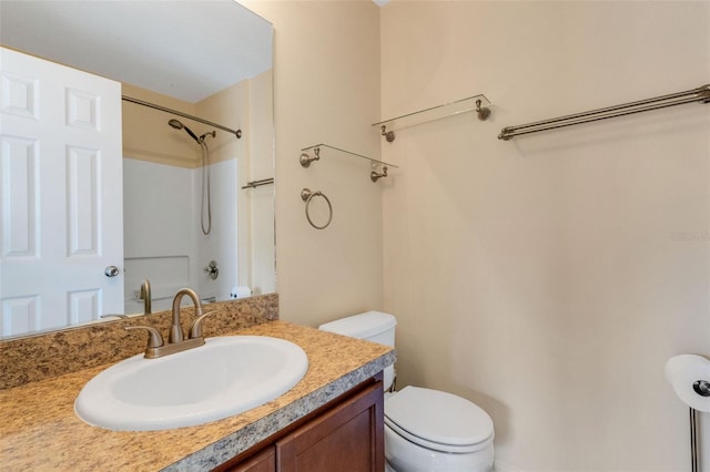 9013 White Sage Loop, Lakewood Ranch, FL 34202 - bathroom with toilet, vanity, and a shower