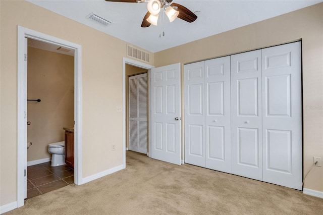 9013 White Sage Loop, Lakewood Ranch, FL 34202 - unfurnished bedroom with light colored carpet, baseboards, connected bathroom, and a closet