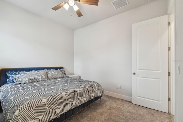 8192 Ivy Stark Blvd, Wesley Chapel, FL 33545 - bedroom with carpet flooring, baseboards, and a ceiling fan