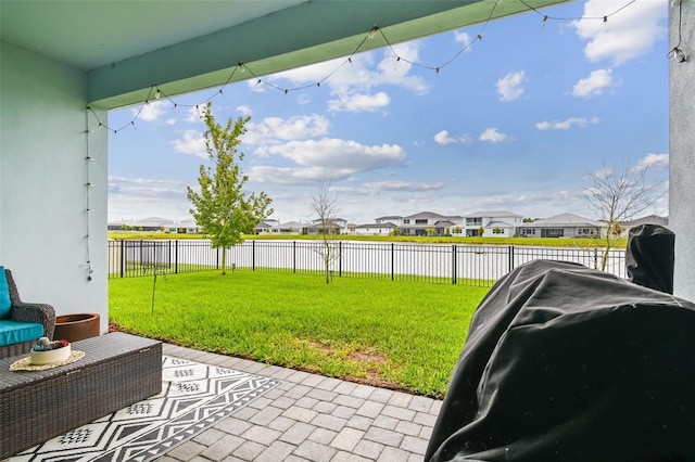 8192 Ivy Stark Blvd, Wesley Chapel, FL 33545 - view of patio / terrace with a residential view and a water view