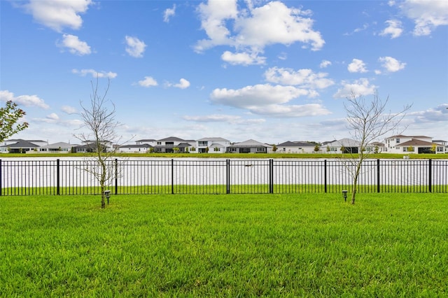 8192 Ivy Stark Blvd, Wesley Chapel, FL 33545 - view of yard with a residential view and a water view