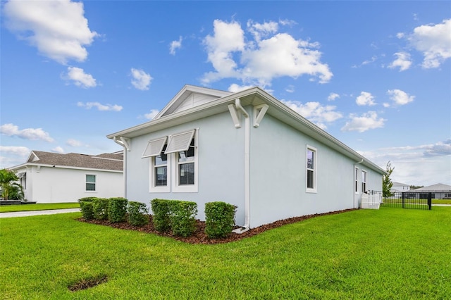 8192 Ivy Stark Blvd, Wesley Chapel, FL 33545 - view of side of property featuring stucco siding