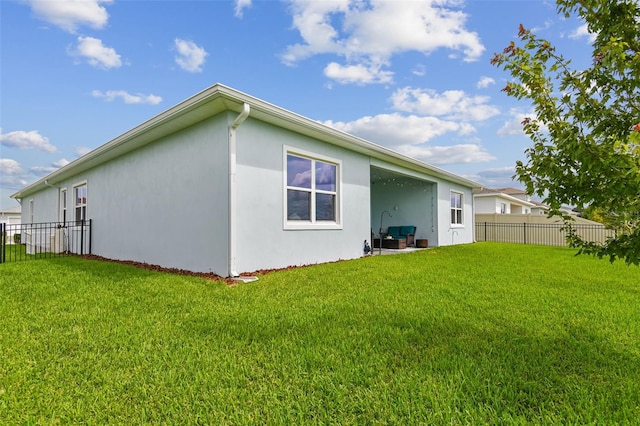 8192 Ivy Stark Blvd, Wesley Chapel, FL 33545 - back of property featuring stucco siding