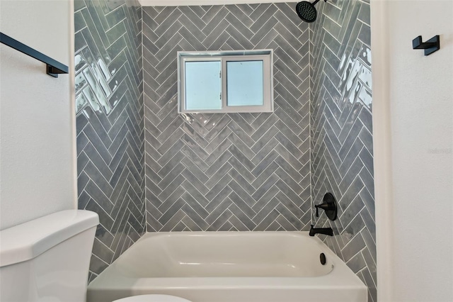 695 Sunset Dr, Tarpon Springs, FL 34689 - bathroom featuring toilet and bathtub / shower combination