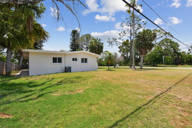 695 Sunset Dr, Tarpon Springs, FL 34689 - view of yard featuring cooling unit