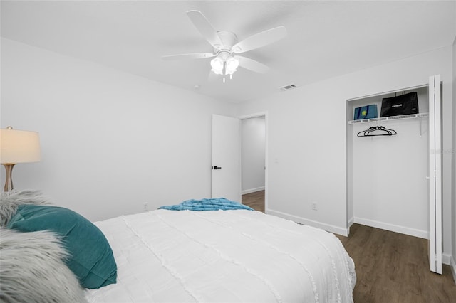 3927 Spence Ave, Tampa, FL 33614 - bedroom featuring wood finished floors, baseboards, and ceiling fan
