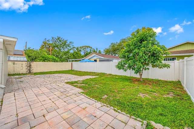 3927 Spence Ave, Tampa, FL 33614 - view of yard featuring a patio area