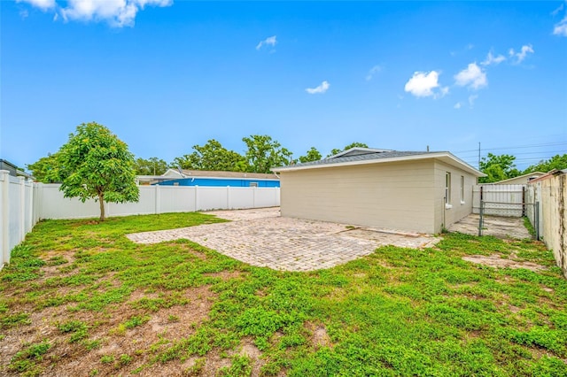 3927 Spence Ave, Tampa, FL 33614 - view of yard featuring a patio