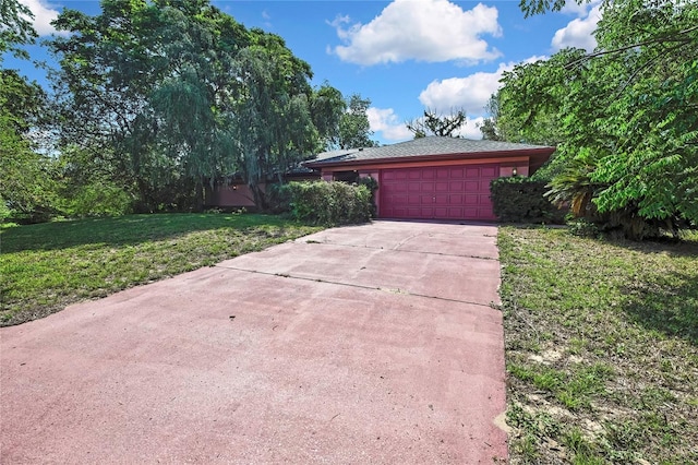4388 Tiffin Ave, Spring Hill, FL 34609 - garage with driveway