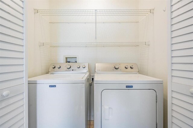 2355 Bentley Dr, Palm Harbor, FL 34684 - laundry room featuring washer and clothes dryer