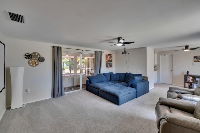 4502 19th Street Cir W, Bradenton, FL 34207 - carpeted living room with a ceiling fan and baseboards