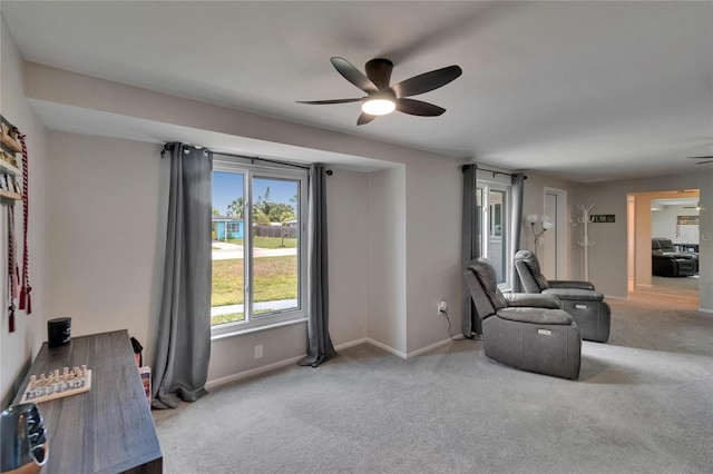 4502 19th Street Cir W, Bradenton, FL 34207 - living area featuring a ceiling fan, carpet, and baseboards