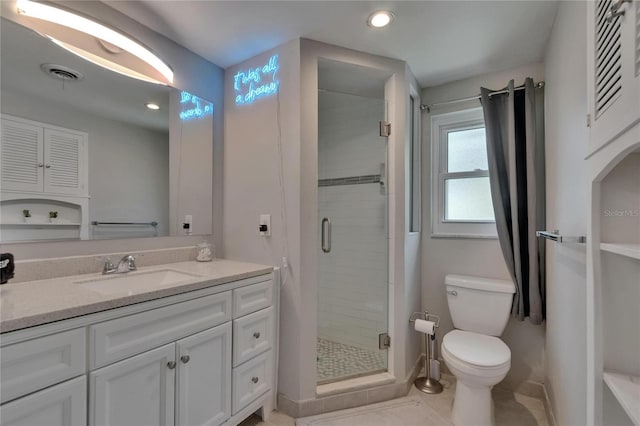 4502 19th Street Cir W, Bradenton, FL 34207 - full bathroom with a shower stall, toilet, vanity, recessed lighting, and tile patterned flooring
