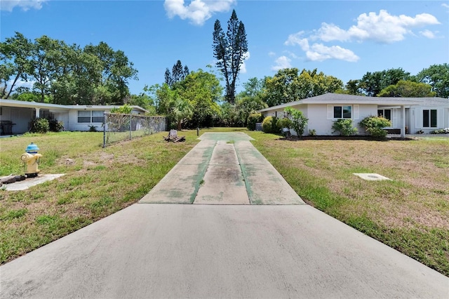 4502 19th Street Cir W, Bradenton, FL 34207 - view of yard featuring concrete driveway