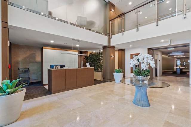 400 4th Ave S Unit 508, Saint Petersburg, FL 33701 - welcome area featuring a towering ceiling, ornate columns, and recessed lighting