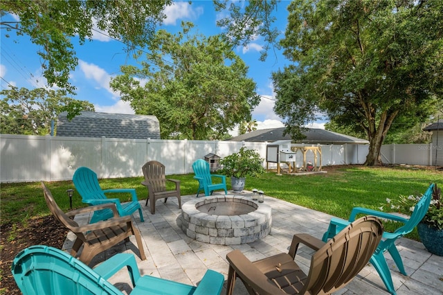 811 Patricia Pl, Lakeland, FL 33809 - view of patio / terrace featuring an outdoor fire pit