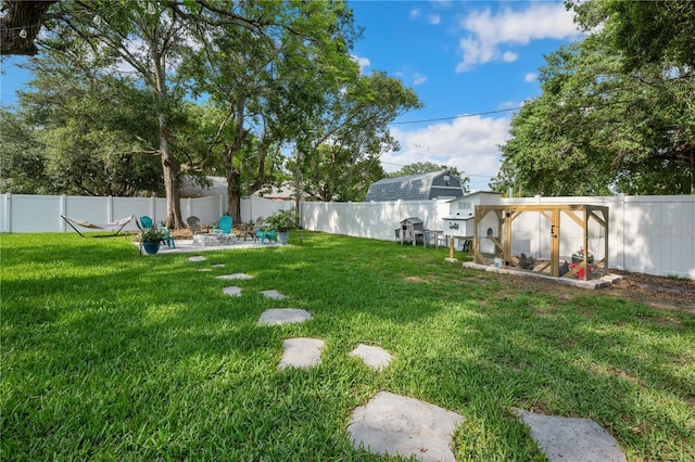811 Patricia Pl, Lakeland, FL 33809 - view of yard featuring a patio and exterior structure