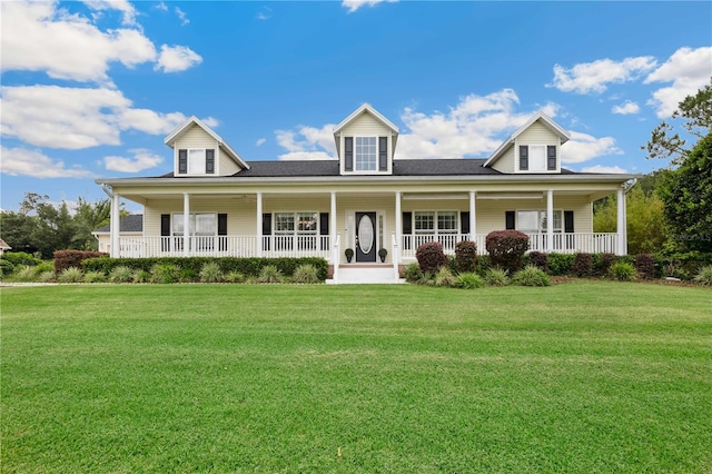 9830 Caribou Trl, Dade City, FL 33525 - view of front of property with a porch and a front yard