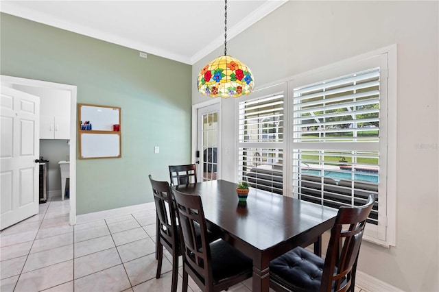 9830 Caribou Trl, Dade City, FL 33525 - dining room with baseboards, ornamental molding, and light tile patterned flooring