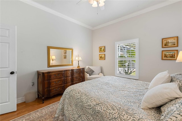 9830 Caribou Trl, Dade City, FL 33525 - bedroom featuring wood finished floors, crown molding, a ceiling fan, and baseboards