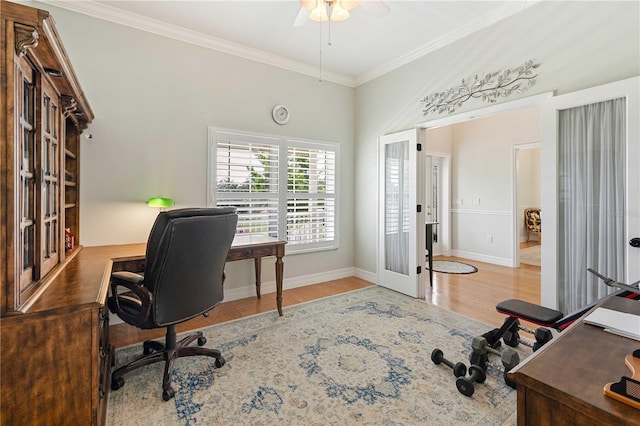 9830 Caribou Trl, Dade City, FL 33525 - office space featuring french doors, wood finished floors, a ceiling fan, ornamental molding, and baseboards