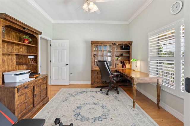 9830 Caribou Trl, Dade City, FL 33525 - office area with plenty of natural light, crown molding, a ceiling fan, light wood-style flooring, and baseboards
