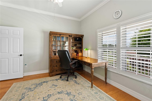 9830 Caribou Trl, Dade City, FL 33525 - office featuring crown molding, wood finished floors, a ceiling fan, and baseboards