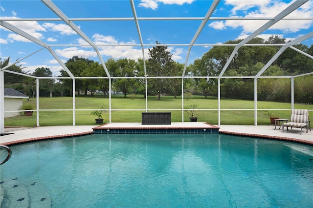 9830 Caribou Trl, Dade City, FL 33525 - swimming pool featuring glass enclosure, a patio, and a yard
