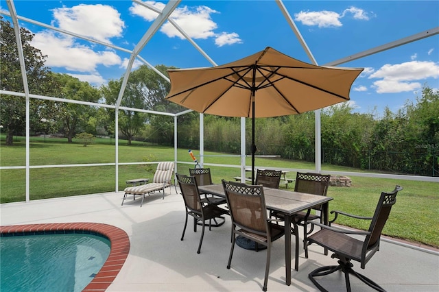 9830 Caribou Trl, Dade City, FL 33525 - view of patio featuring a lanai, an outdoor pool, outdoor dining area, and view of scattered trees