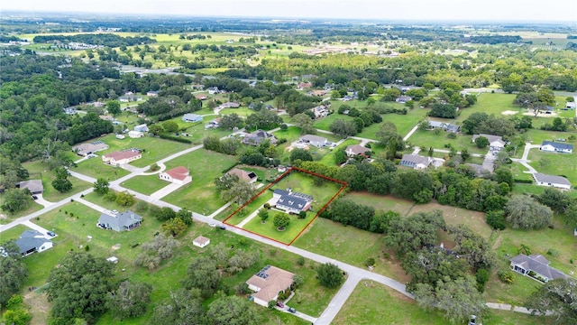 9830 Caribou Trl, Dade City, FL 33525 - aerial view of residential area featuring property boundaries highlighted