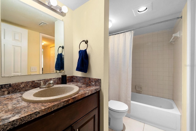 1905 Oyster Catcher Ln Unit 924, Clearwater, FL 33762 - bathroom with vanity, toilet, tile patterned flooring, and shower / bath combination with curtain