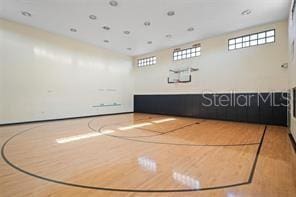 1905 Oyster Catcher Ln Unit 924, Clearwater, FL 33762 - view of sport court with basketball hoop and plenty of natural light